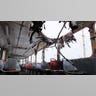 The roof of a bus is blown up.