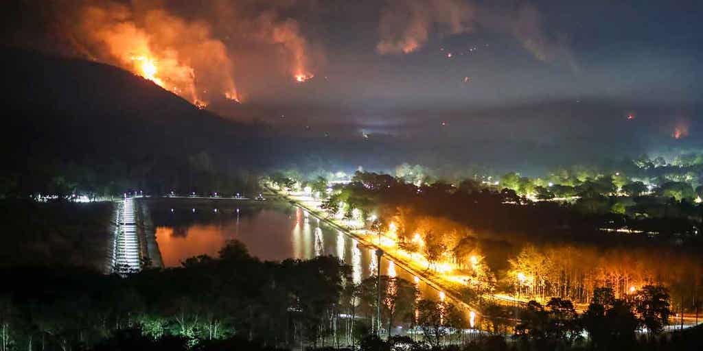 Thailand tries to contain overnight fire that engulfed 2 mountains - Vimarsana News