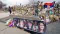 FILE - Pictures of the 10 victims of a mass shooting in a King Soopers grocery store are posted on a cement barrier outside the supermarket in Boulder, Colo., on April 23, 2021. More relatives of people shot to death at a Colorado supermarket in 2021 are suing gun-maker Sturm, Ruger &amp; Co. over how it marketed the firearm used in the massacre, adding to litigation first filed earlier this month against the company. (AP Photo/David Zalubowski, File)