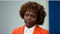 White House Press Secretary Karine Jean-Pierre listens as National Security Council coordinator for strategic communications John Kirby speaks during a daily news briefing at the James S. Brady Press Briefing Room in the White House on March 22, 2023 in Washington, DC.