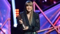 LOS ANGELES, CALIFORNIA - MARCH 27: (FOR EDITORIAL USE ONLY) Honoree Taylor Swift accepts the iHeartRadio Innovator Award onstage during the 2023 iHeartRadio Music Awards at Dolby Theatre in Los Angeles, California on March 27, 2023. Broadcasted live on FOX. (Photo by Kevin Winter/Getty Images for iHeartRadio)