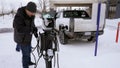 daily news top stories today Lawrence Ziehr, project manager for energy recovery on GM's electric vehicles, connects a Hummer EV to a charging station, Wednesday, Feb. 22, 2023, in Sault Ste. Marie, Mich. Some automakers and drivers fear lower battery range in the cold could limit acceptance of electric cars, trucks and buses, at a time when emissions from transportation must go down sharply to address climate change. (AP Photo/Carlos Osorio)