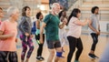Large group of people dancing at Zumba class - Fox News