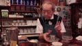 Coffee shop owner Shizuo Mori serves pudding to his customers in Tokyo, Japan.