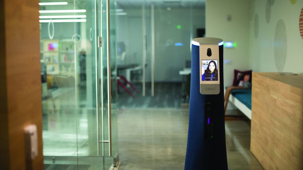 A robot keeping patrol of an office.
