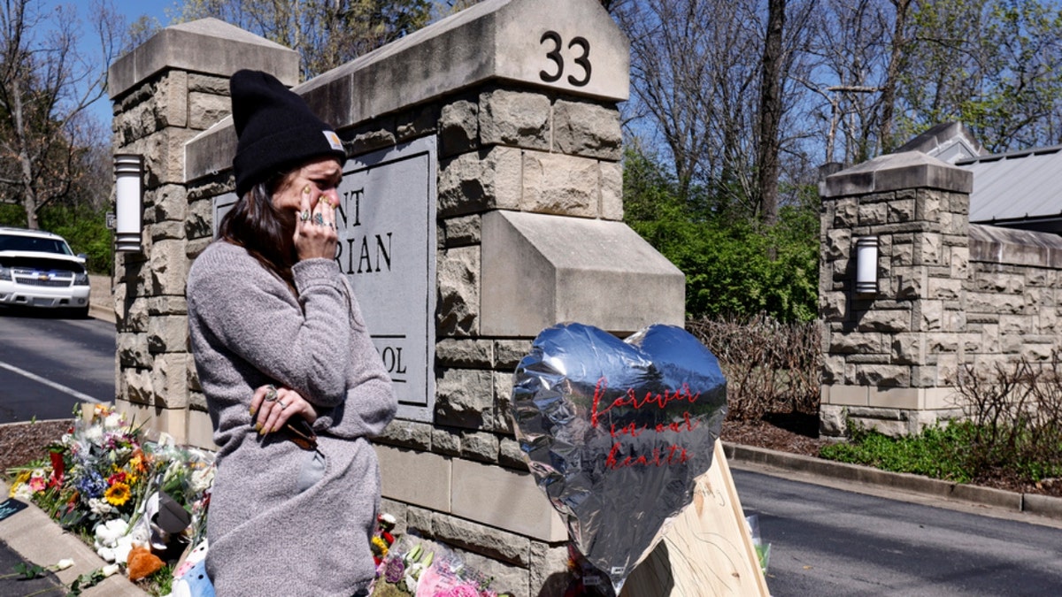 a memorial at the entrance to The Covenant School