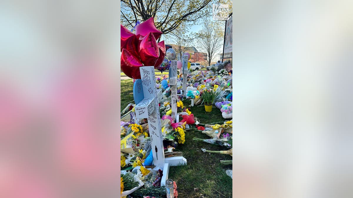 Memorials for the six victims who were killed in a mass shooting are placed outside of The Covenant School