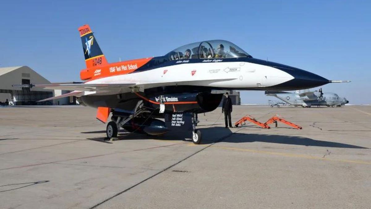 Jet ready for taken outside of a hangar.