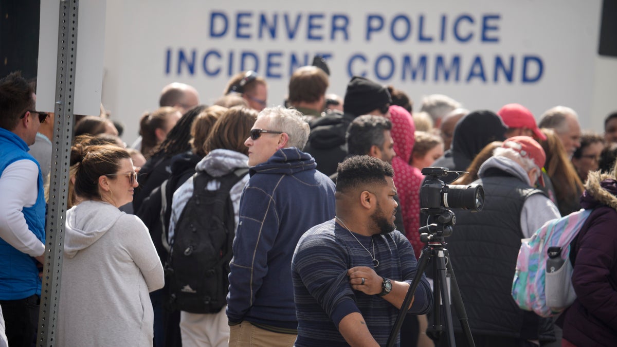 parents wait outside Denver high school