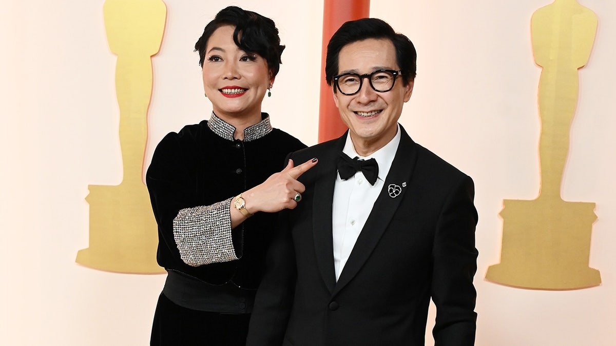 Ke Huy Quan and wife Echo hold hands on Oscars red carpet