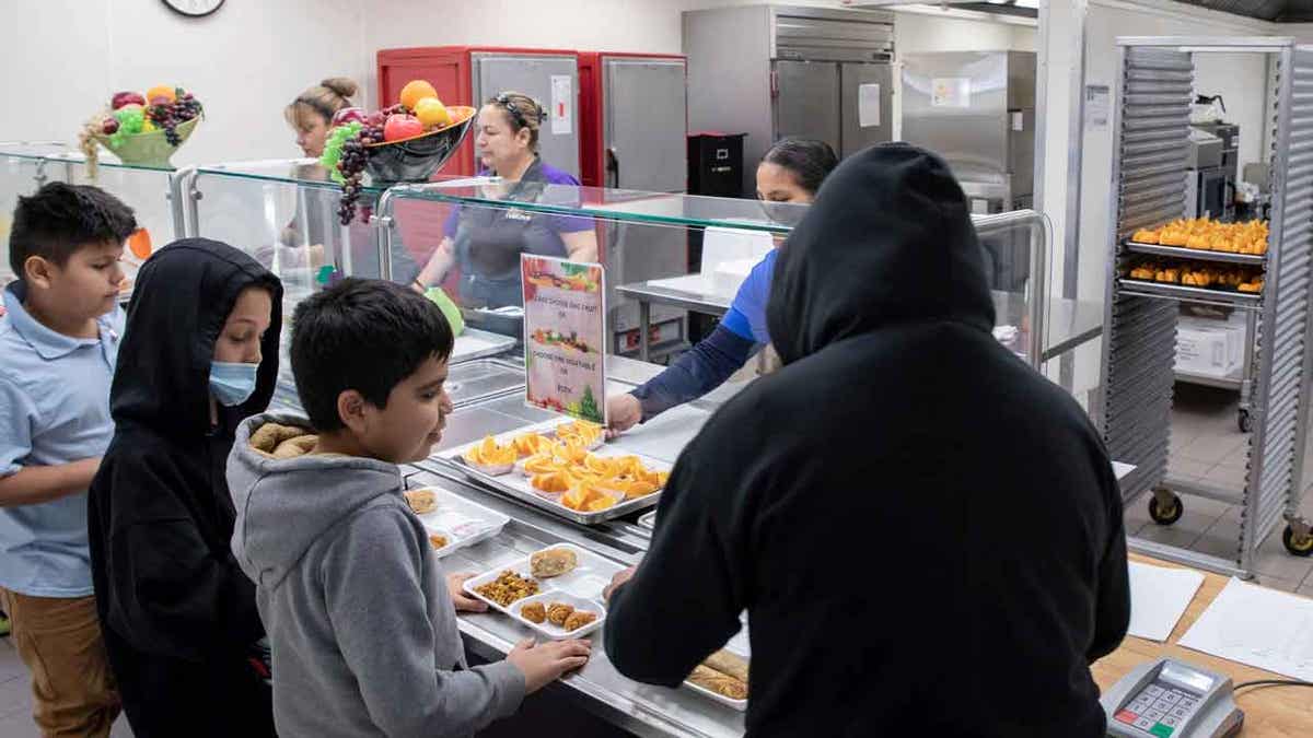 Students select their meal during lunch 