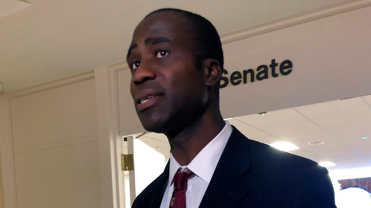 Dr. Joseph Ladapo speaks with reporters after the Florida Senate confirmed his appointment as the state's surgeon general.