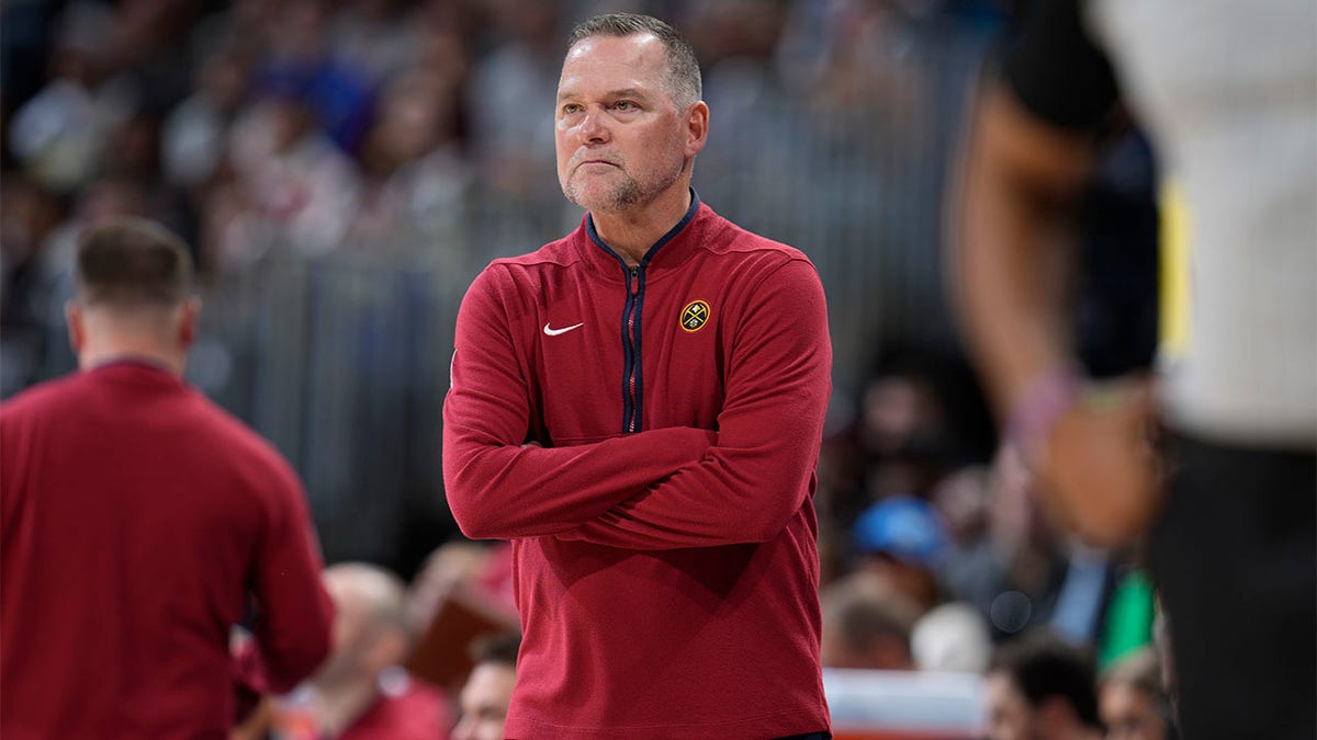 Michael Malone coaches against the Nets