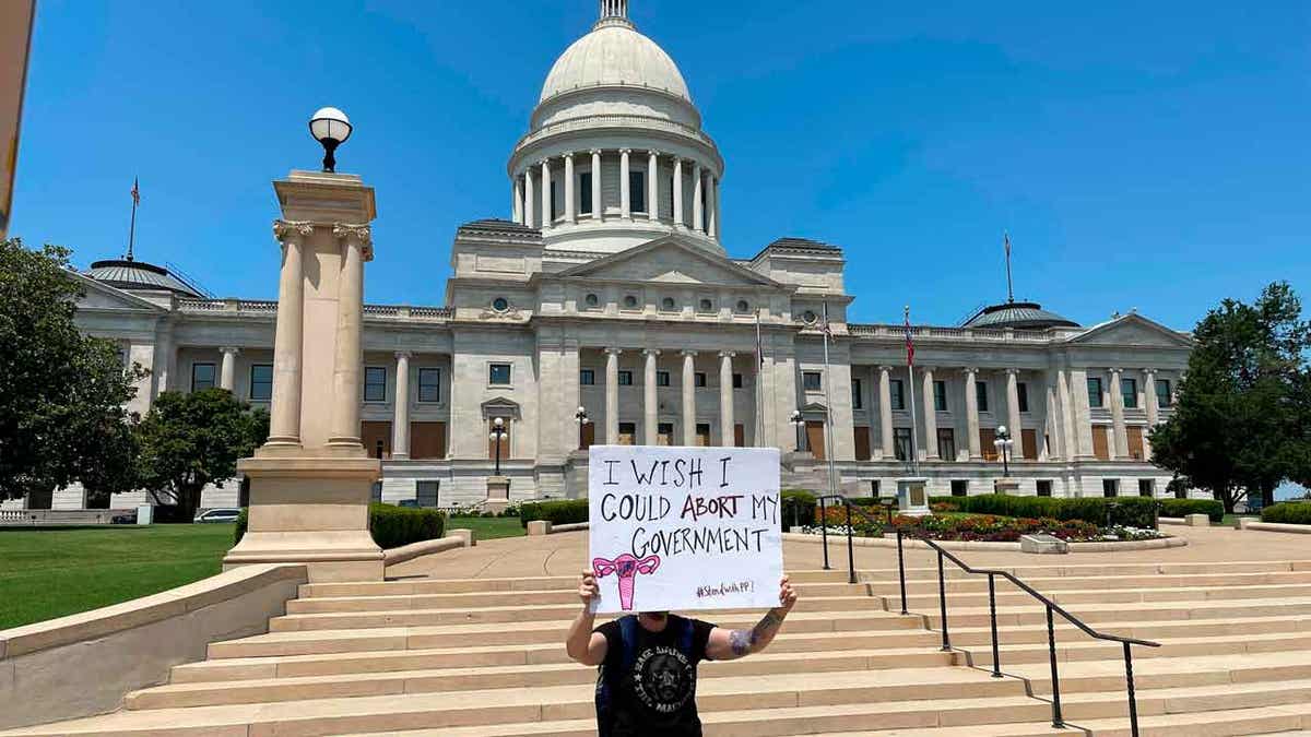 Man outside Arkansas state house