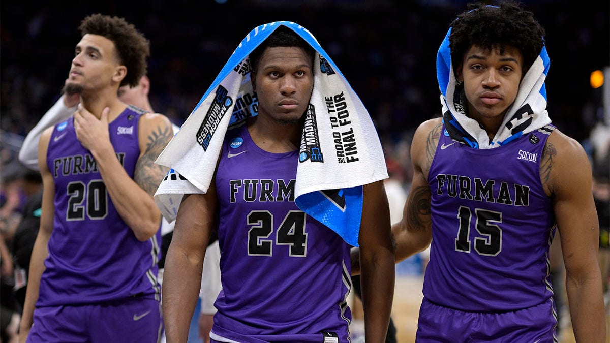 Furman players after losing in the NCAA Tournament