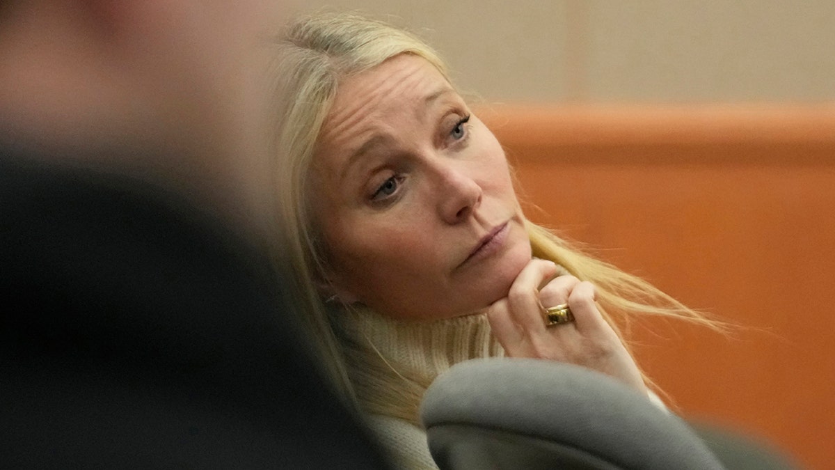 Gwyneth Paltrow looked outstretched in court with her hand under her chin