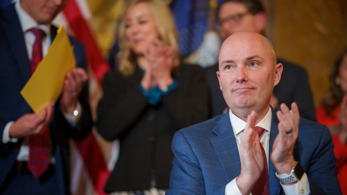 Utah Gov. Spencer Cox clapping his hands