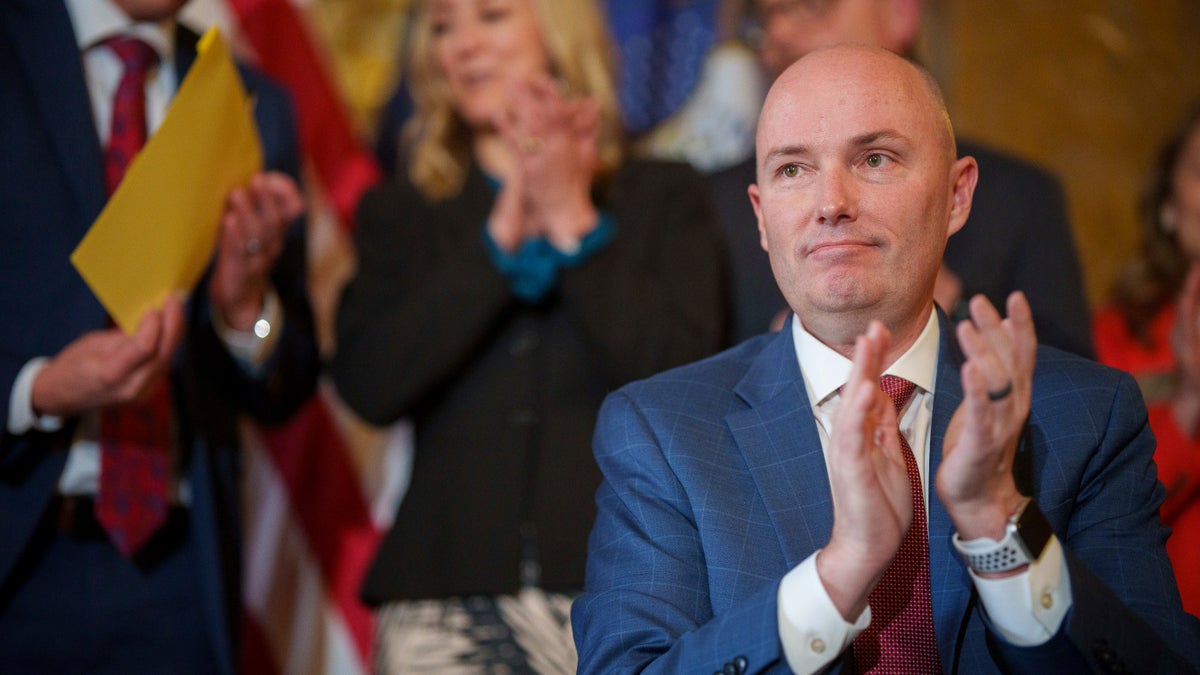 Utah governor claps his hands