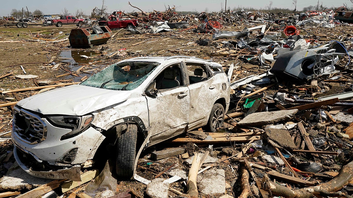 car and debris from Mississippi tornado