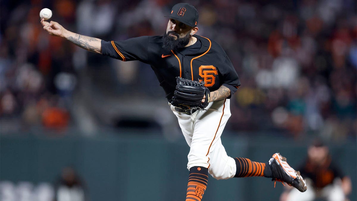 Sergio Romo pitches against the A's
