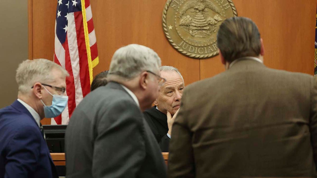 Judge Kent Holmberg talks with attorneys during the lawsuit trial of Terry Sanderson vs. Gwyneth Paltrow