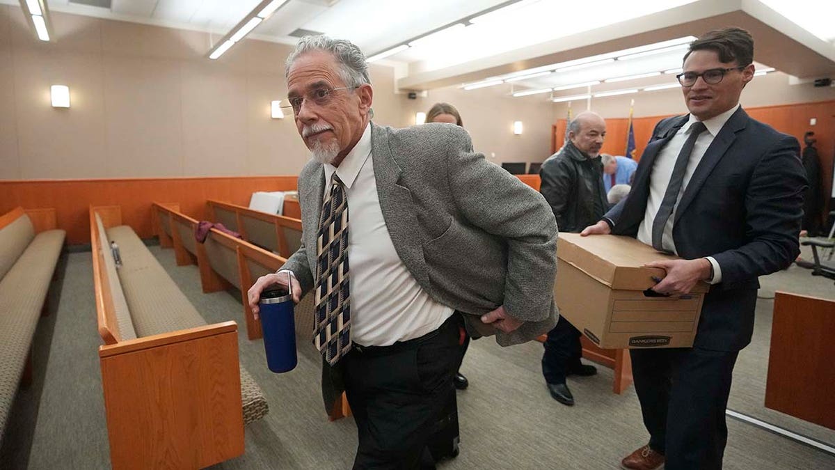 Terry Sanderson leaves the courtroom.