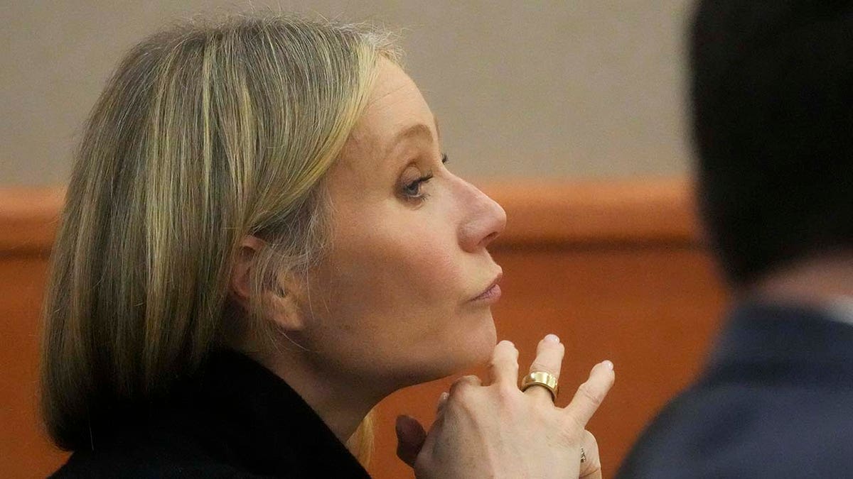Gwyneth Paltrow sits in court during an objection by her attorney during her trial.