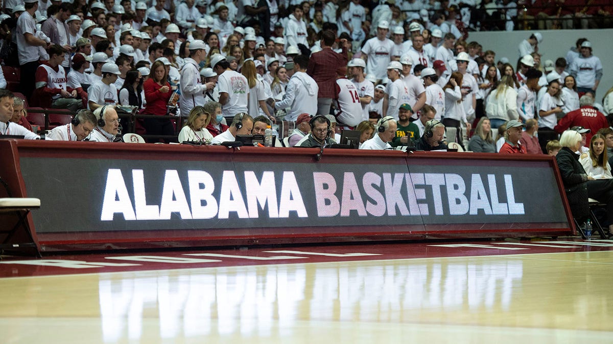 Alabama Basketball sign before a game