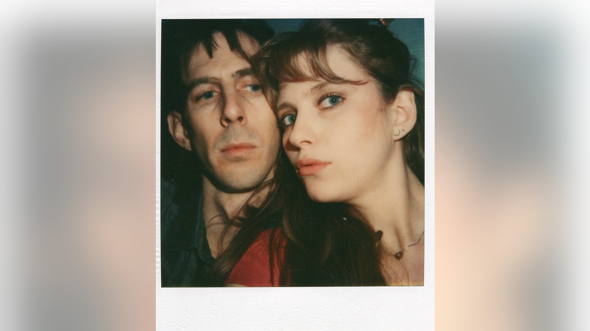 A polaroid photo of Ric Ocasek and Bebe Buell