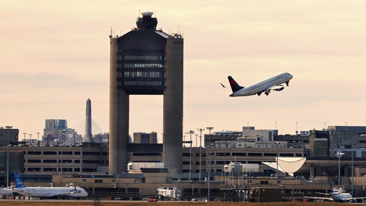 A plane takes off at Boston Logan International Airport