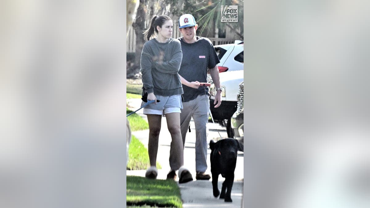 Buster Murdaugh on walk with dogs and Brooklynn White