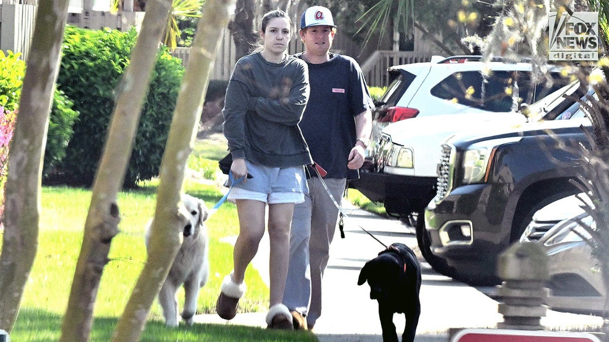 Buster Murdaugh walking dogs with Brooklynn White