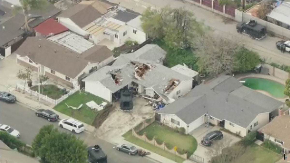 aerial view of standoff scene outside home