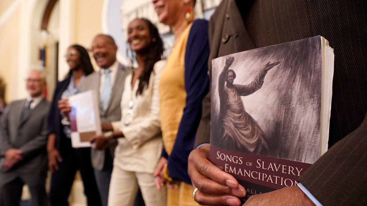California reparations task force members pose for photo