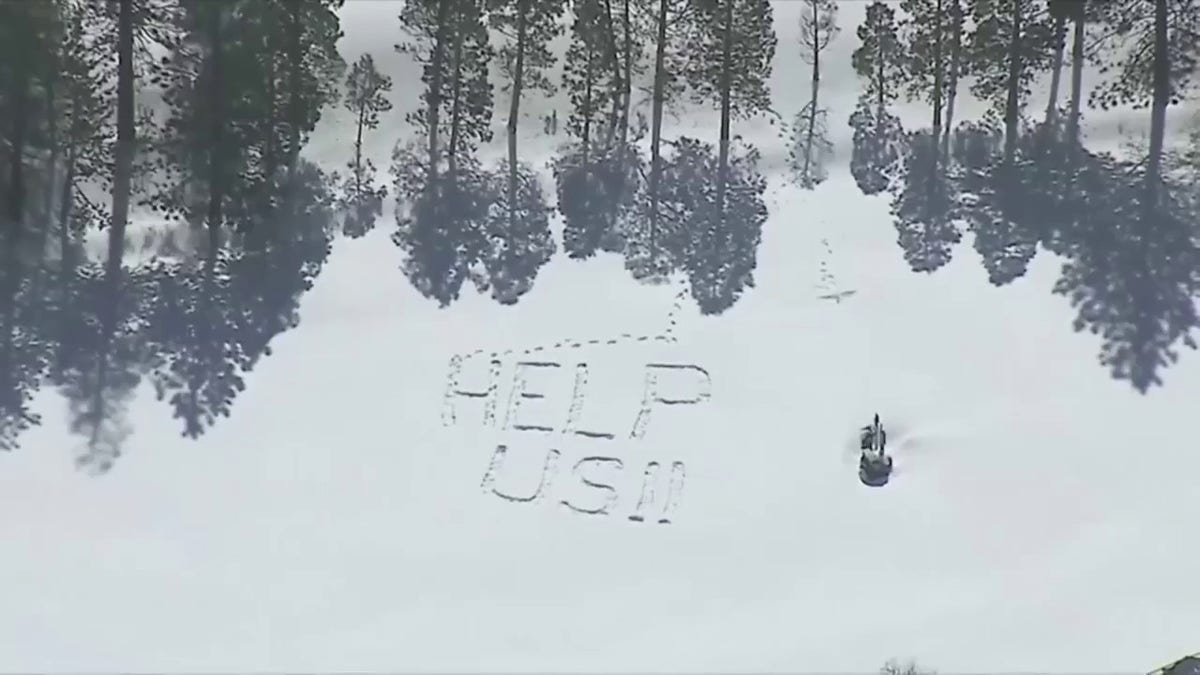 Help Us message seen in California snow
