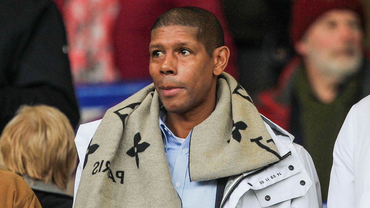 Carlton Palmer looks on