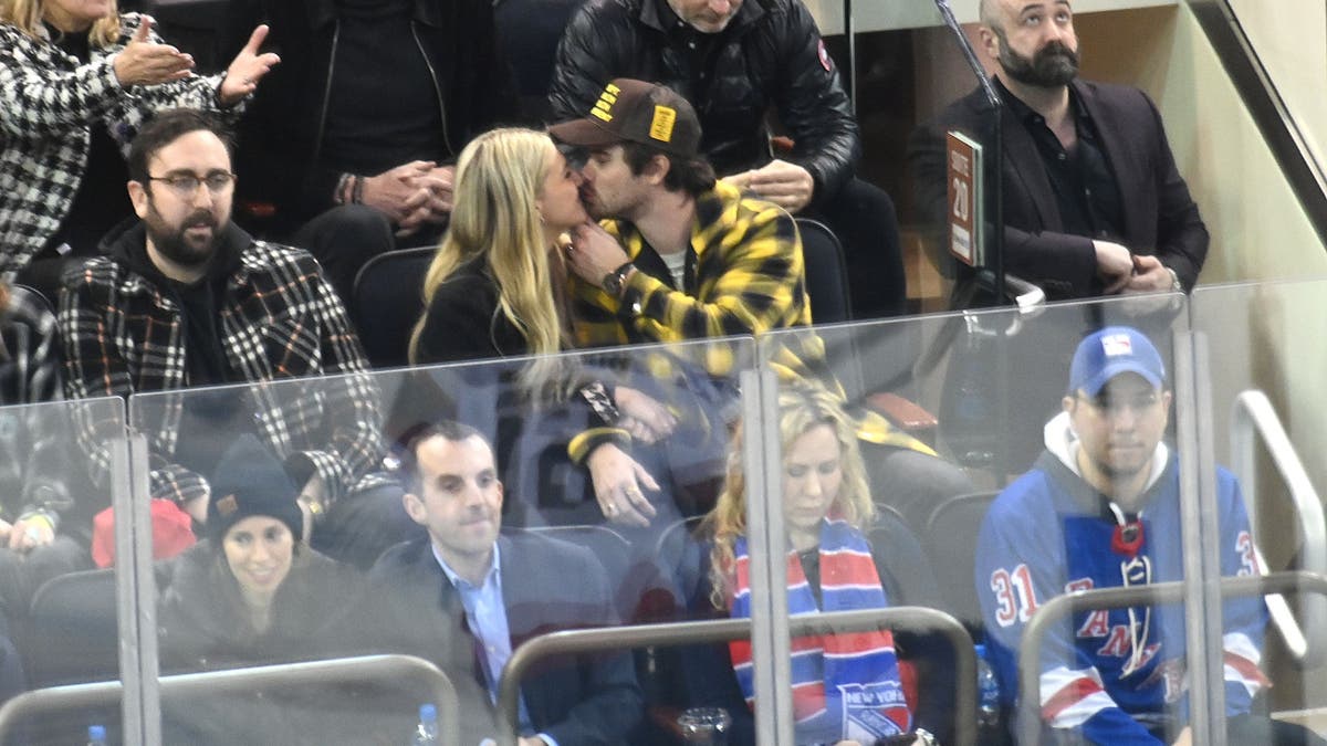 Kelsea Ballerini and Chase Stokes share a kiss