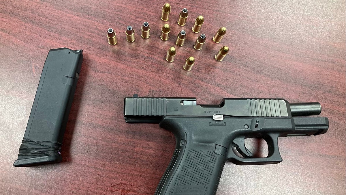 gun and bullets found in pocket of Christian Jacquez Taylor