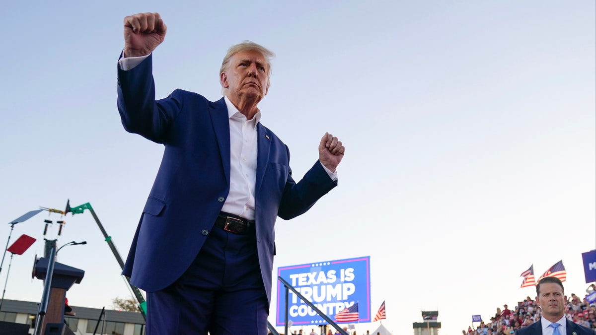 Donald Trump in blue blazer at rally