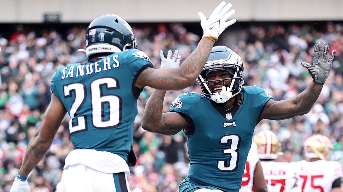 Zach Pascal celebrates with his teammate Miles Sanders