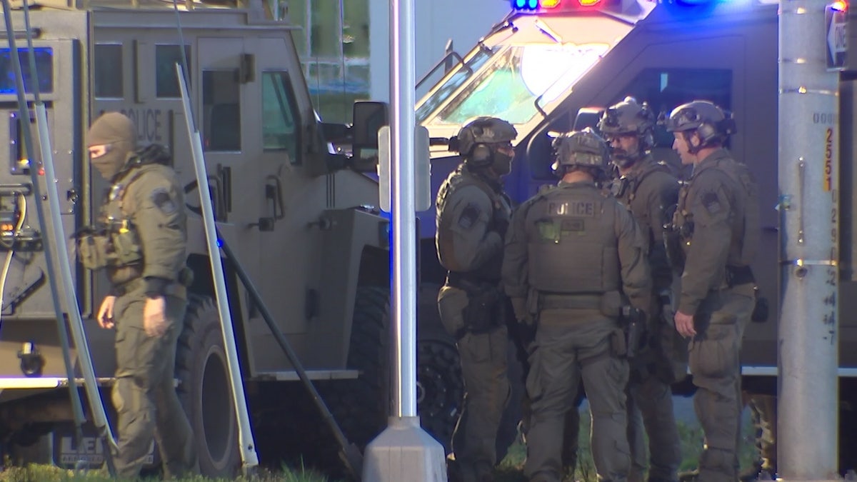 tactical unit on standby at armed standoff in Virginia