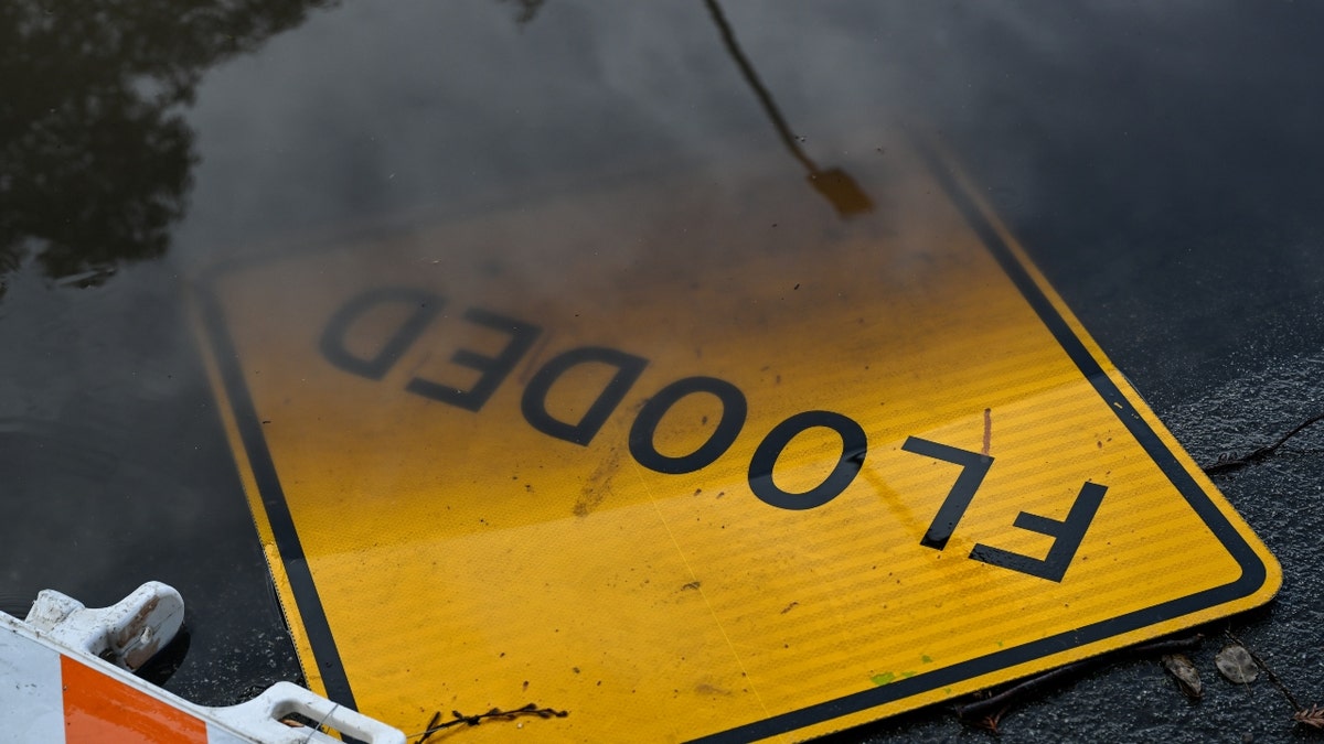 A flooded street sign in Melo Park, Calif.