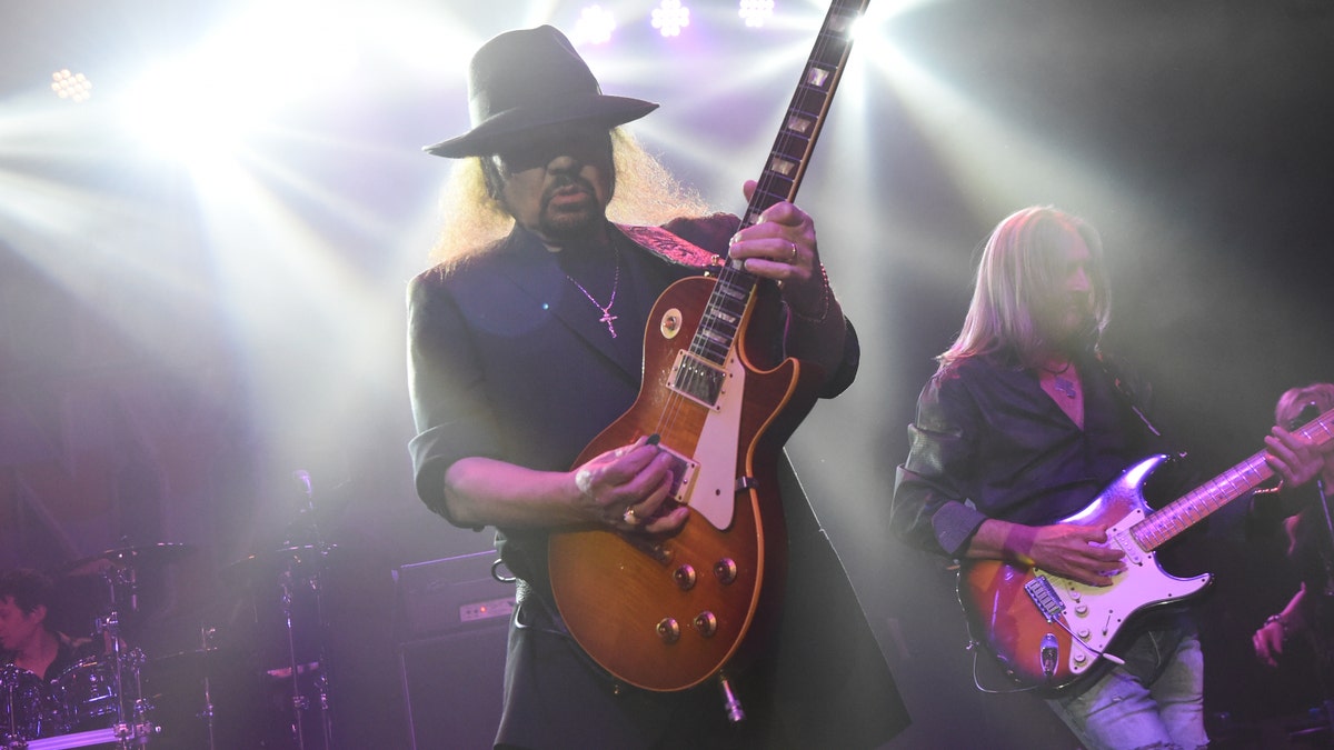 Lynyrd Skynyrd guitarist Gary Rossington plays on stage