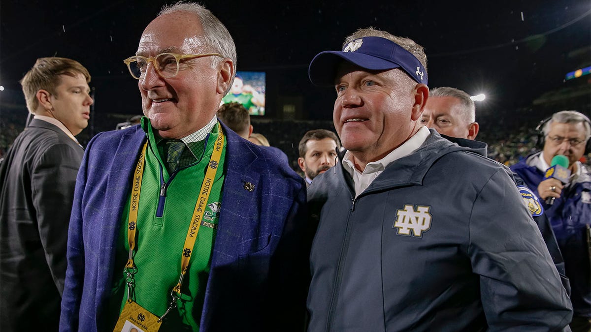 Jack Swarbrick and Brian Kelly after a Notre Dame football game
