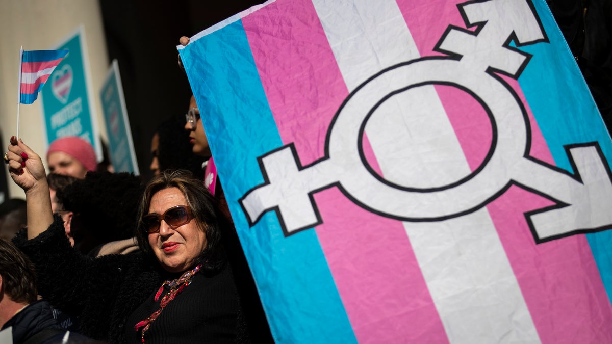 Trans activist with flag