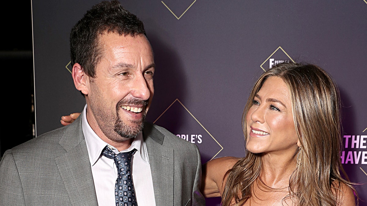 Jennifer Aniston and Adam Sandler on the 2019 People's Choice Awards red carpet