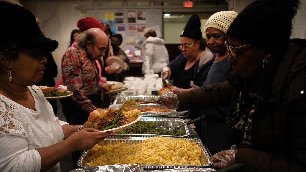 Homeless people eating