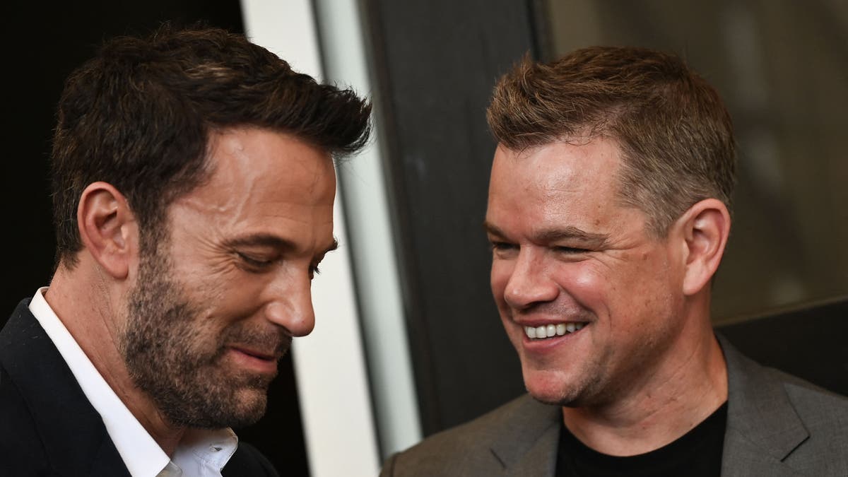 close up of Ben Affleck and Matt Damon smiling