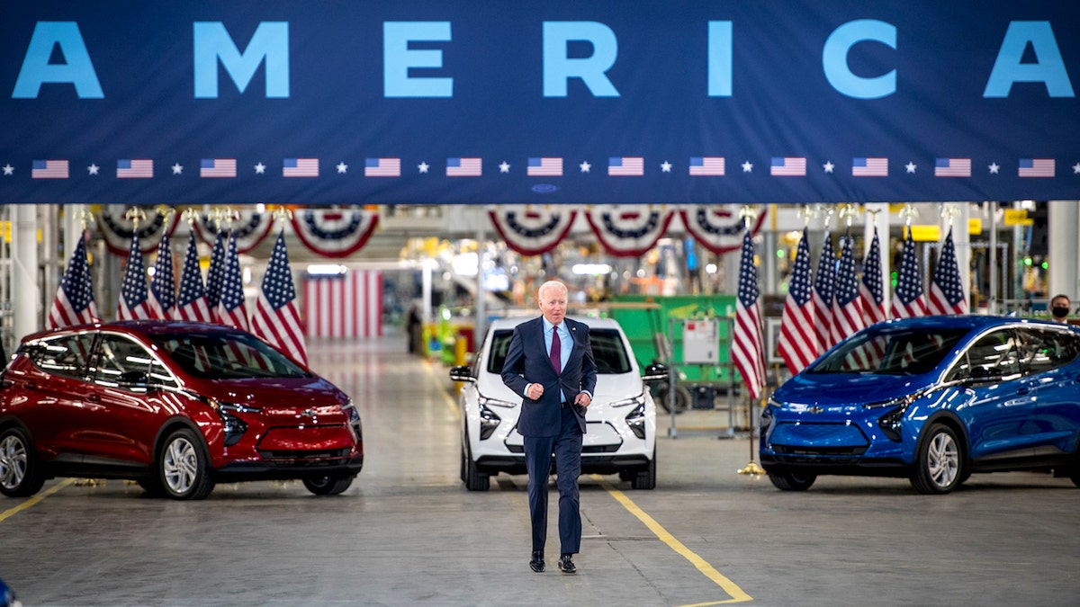 President Joe Biden makes his entrance at General Motors' Factory ZERO electric vehicle assembly plant in Detroit, Michigan. 