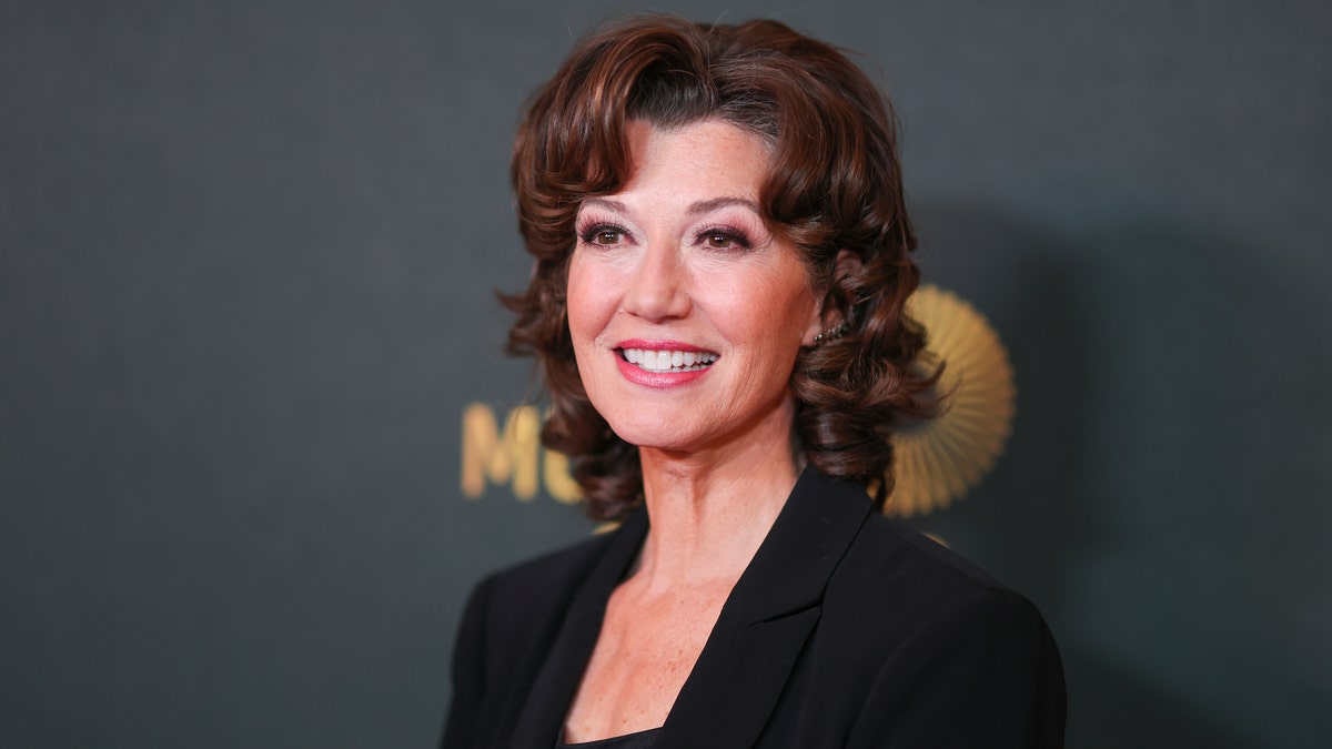 Amy Grant wearing a black jacket at an event